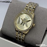 Часовник за жени Michael Kors MK7540 Bryant. Верижка метална в златист цвят. Кварцов механизъм. Водозащита 5 АТМ (душ).