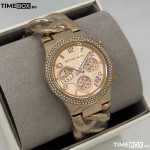 Часовник за жени Michael Kors MK3247 Twist Champagne. Верижка метална в златист цвят. Кварцов механизъм. Водозащита 5 АТМ (душ).