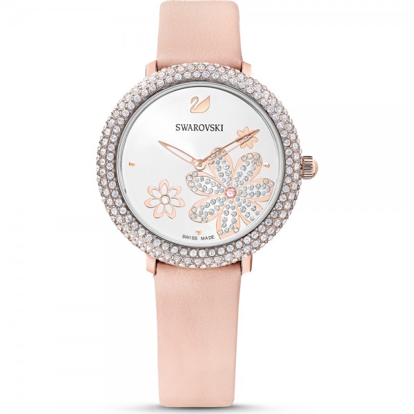 Swarovski 5519223 Crystal Rose Часовник за жени Swarovski 5519223 Crystal Rose. Верижка естествена кожа в розов цвят. Кварцов механизъм. Водозащита 5 АТМ (душ).