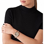Часовник за жени Michael Kors MK7217 Lexington Chronograph. Верижка метална в златист цвят. Кварцов механизъм. Водозащита 10 АТМ (плуване).